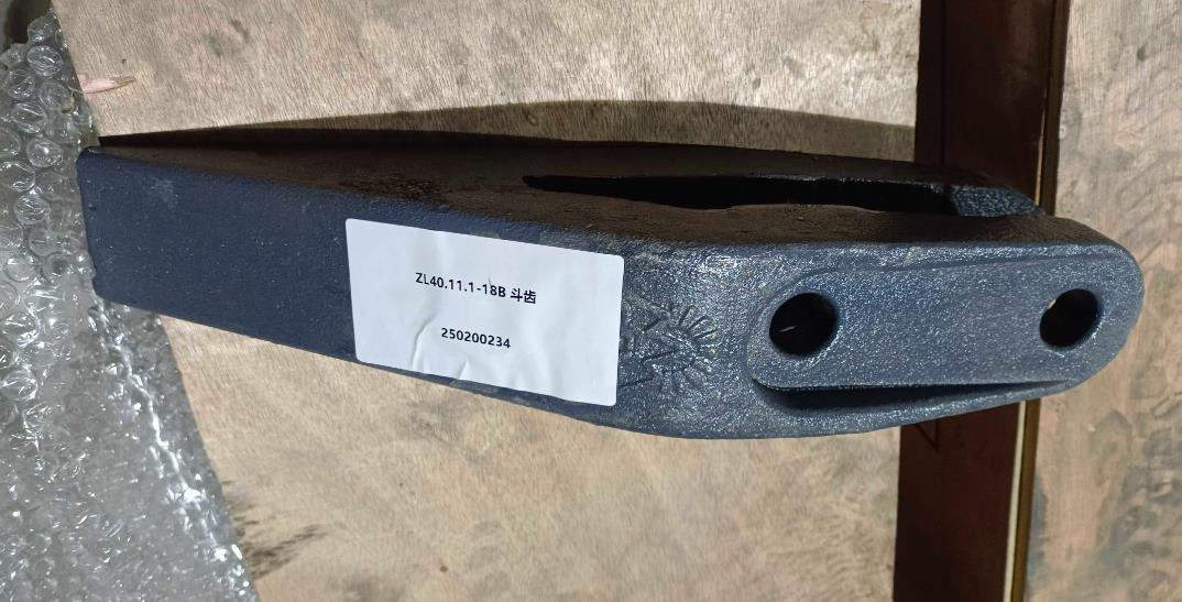 Зуб ковша центральный 300FN